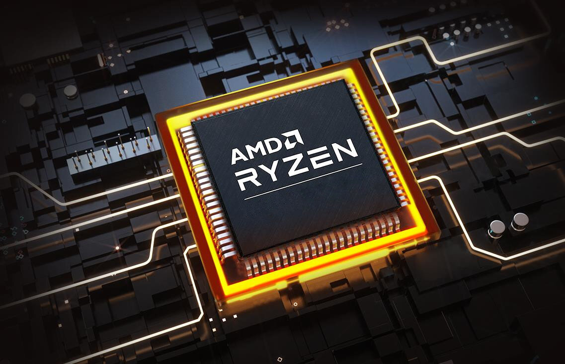 Obraz przedstawia procesor z napisem \'AMD RYZEN\' umieszczony na tle schematu elektronicznego z podświetleniem w kolorze pomarańczowym.