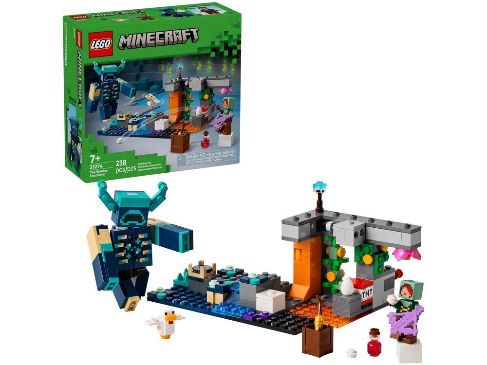Zestaw LEGO przedstawia scenę z gry Minecraft z figurkami i elementami konstrukcyjnymi. W tle widoczny jest zielony karton z logo LEGO i napisem \'MINECRAFT\'.