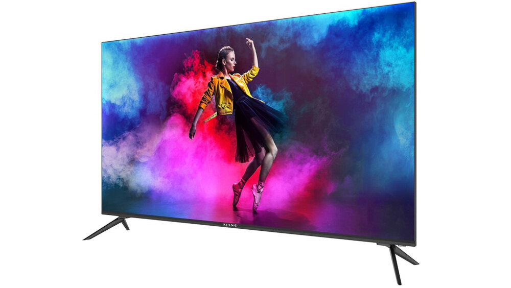 Telewizor z cienką ramką wyświetla kolorowy obraz przedstawiający osobę w dynamicznej pozie na tle kolorowego dymu. Na dolnej ramce widoczne jest logo \'KIANO\'.