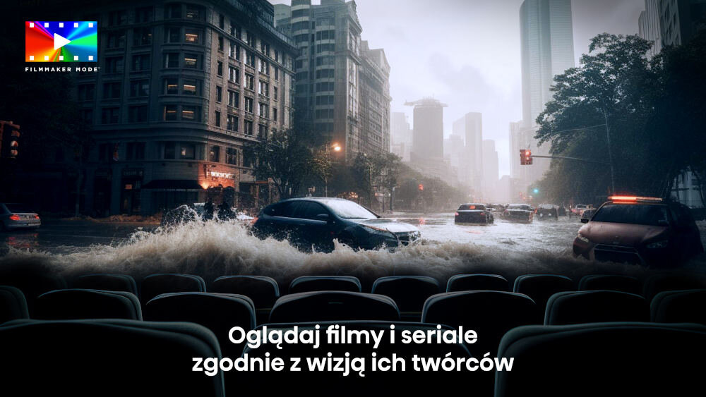 Na obrazie widać zalaną ulicę w mieście z samochodami poruszającymi się przez wodę. Na dole znajduje się tekst: \'Oglądaj filmy i seriale zgodnie z wizją ich twórców\'.