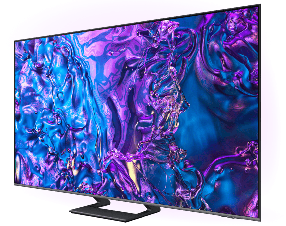 Telewizor z dużym ekranem wyświetlający abstrakcyjną grafikę w odcieniach fioletu i niebieskiego. Urządzenie stoi na prostokątnej podstawie.