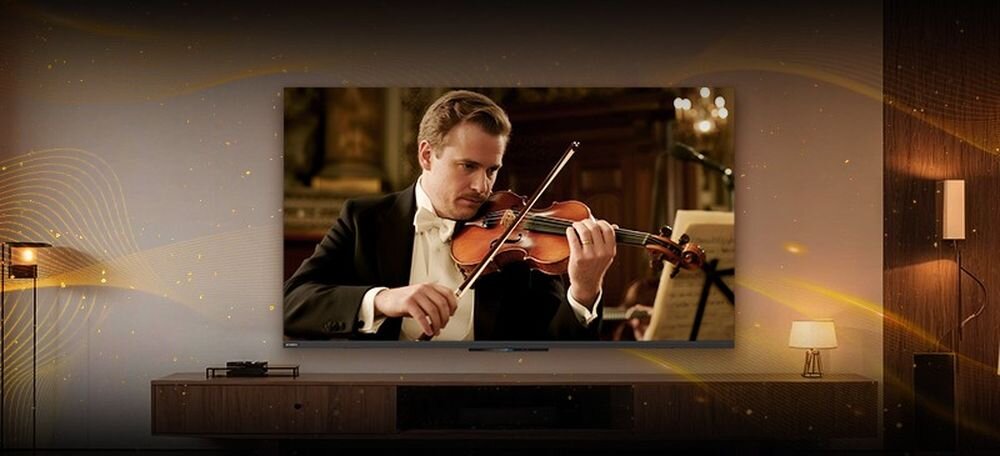 Telewizor METZ 60MNH7030Z Dolby Atmos przestrzenny dźwięk i kino domowe, telewizor zawieszony na ścianie w pomieszczeniu
