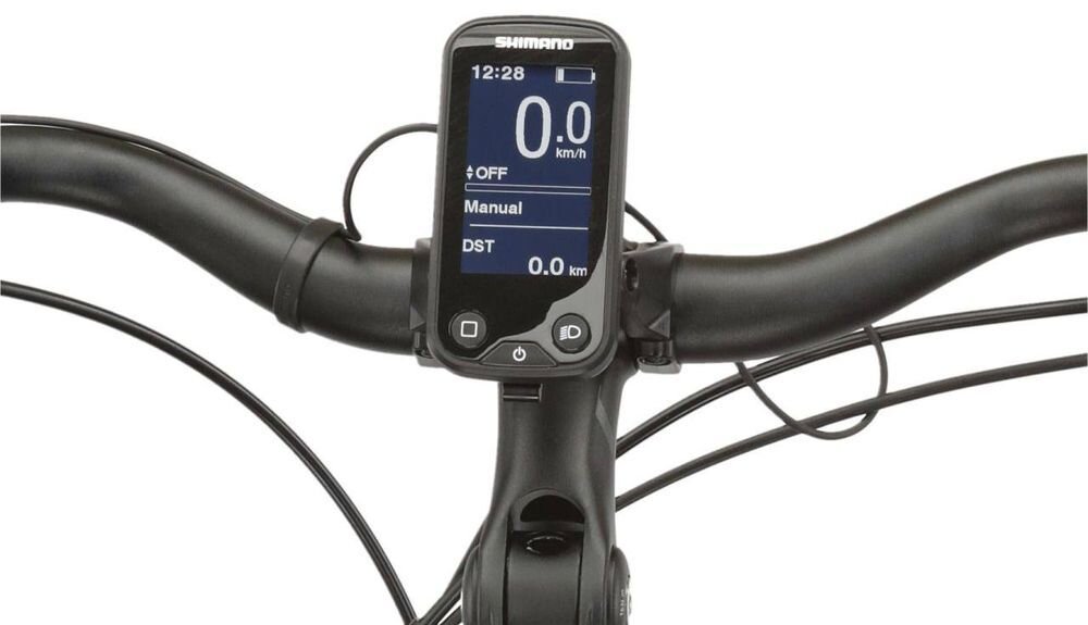 Kierownica roweru z zamontowanym wyświetlaczem marki Shimano, pokazującym prędkość 0.0 km/h, tryb Manual oraz dystans 0.0 km.