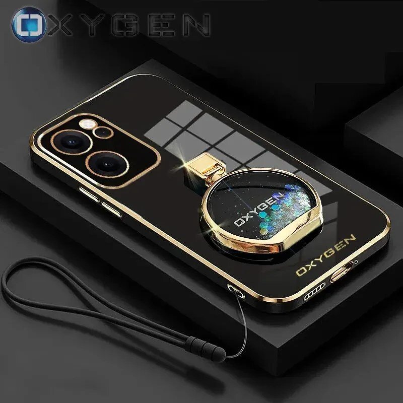 Na obrazie widoczne jest etui na telefon z napisem \'OXYGEN\', w kolorze czarnym z złotymi elementami. Obok etui znajduje się czarny pasek do zawieszenia.