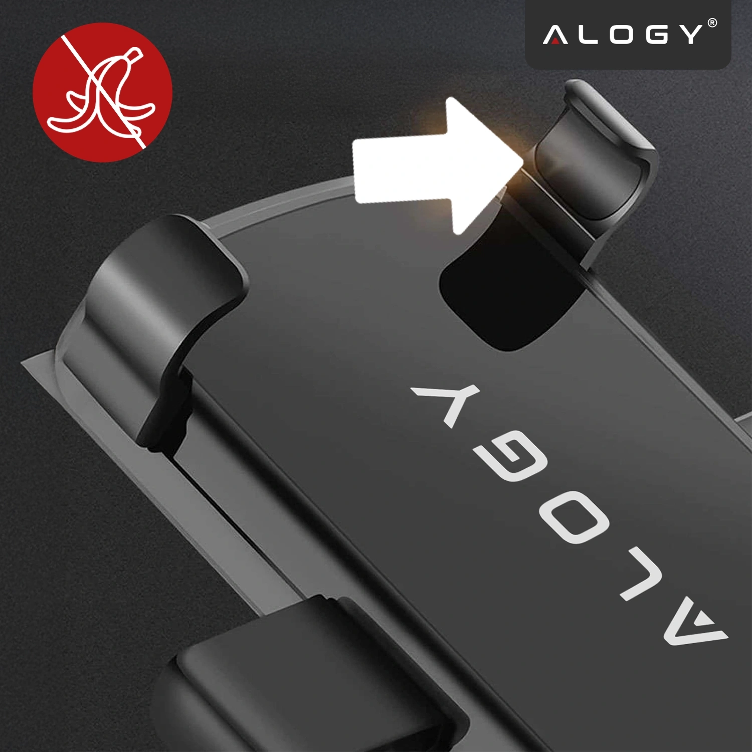 Czarny uchwyt samochodowy na telefon z logo \'ALOGY\' i białą strzałką wskazującą na element uchwytu. W lewym górnym rogu znajduje się czerwone logo z przekreślonym bananem.