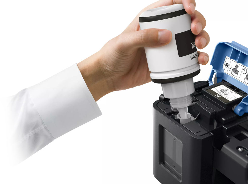 Urządzenie wielofunkcyjne CANON Pixma G2410 Druk w kolorze  prezentacja napełniana zbiornika atramentem białe tło tusze startowe w zestawie