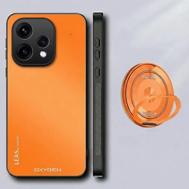 Obraz przedstawia pomarańczowe etui na telefon z trzema dużymi otworami na aparat oraz napisy \'LEAS. CAMERA\' i \'OXYGEN\'. Obok znajduje się okrągły, pomarańczowy uchwyt z napisem \'MagSafe\'.