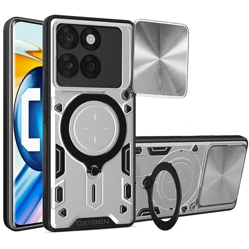 Obraz przedstawia srebrne etui na telefon z napisem \'OXYGEN\', z okrągłym elementem na środku i trzema otworami na aparat. Obok etui znajduje się prostokątny element o metalicznym wyglądzie.