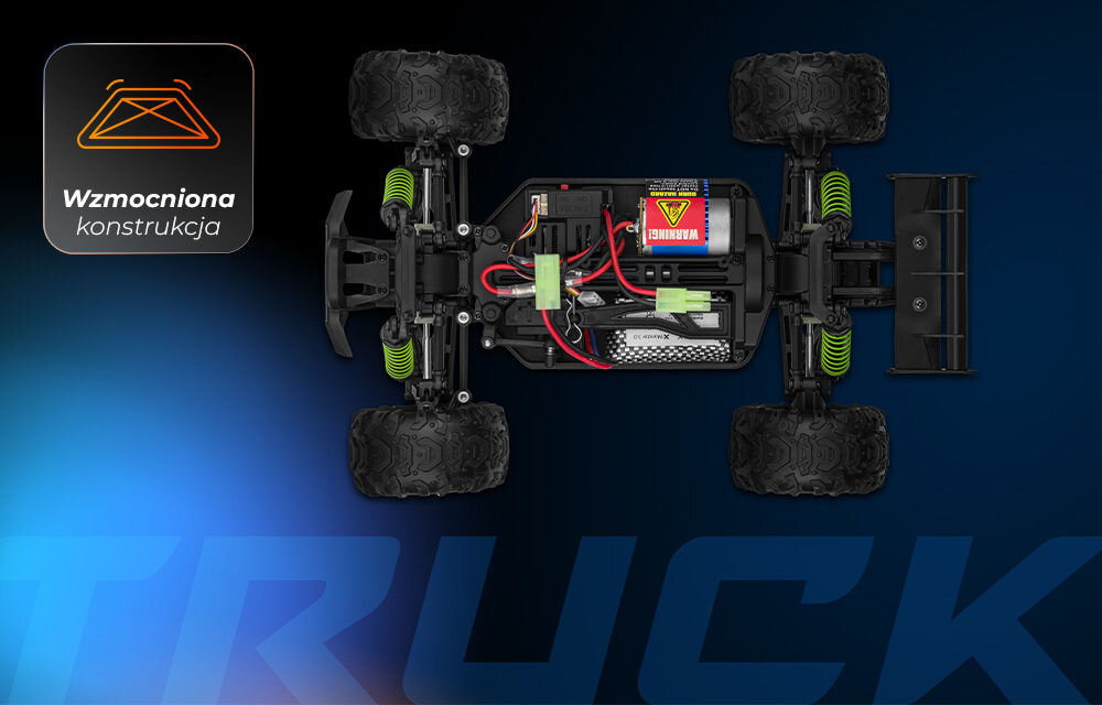 Samochód zdalnie sterowany OVERMAX X-Monster 3.0 Widok z góry na podwozie samochodu RC X-Monster, z widocznymi elementami mechanicznymi, silnikiem i baterią. W lewym górnym rogu ikona trójkątnej konstrukcji z napisem Wzmocniona konstrukcja.