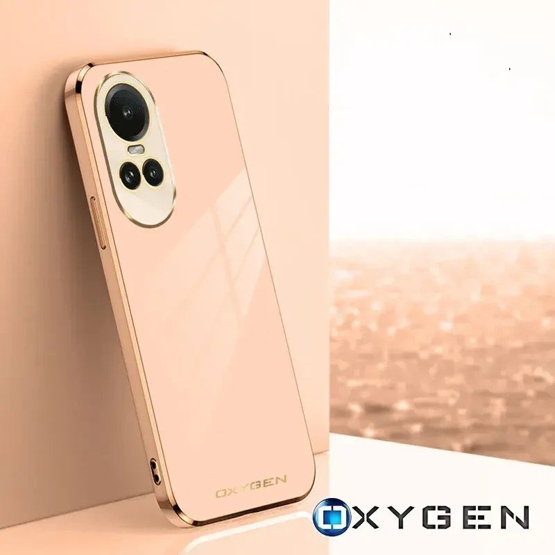 Etui na telefon w kolorze różowego złota z trzema otworami na aparaty fotograficzne. Na dole widoczne jest logo \'OXYGEN\'.