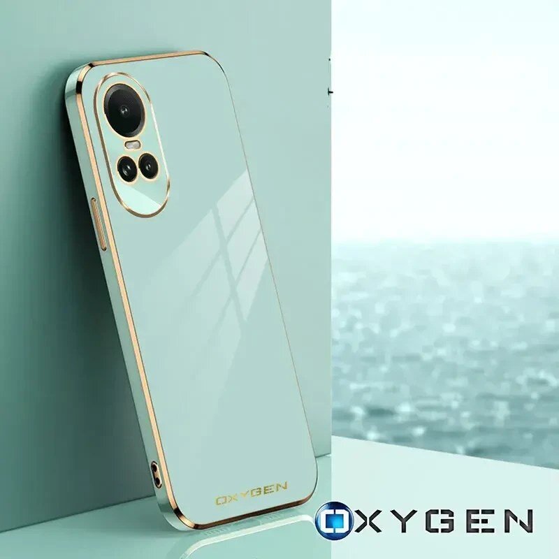 Etui na telefon w kolorze jasnym z metalicznymi krawędziami, z trzema otworami na aparaty. Na dole widoczny jest napis \'OXYGEN\'.