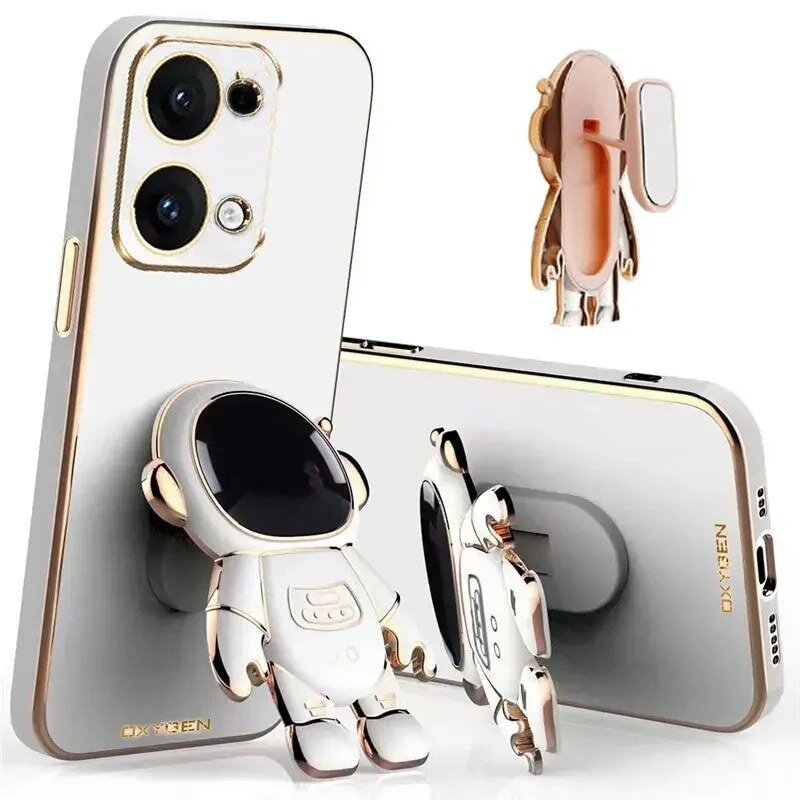 Na obrazie widoczne jest etui na telefon z motywem astronauty, z napisem \'OXYGEN\'. Etui ma metaliczne wykończenie i jest przeznaczone do modelu telefonu z dwoma aparatami.