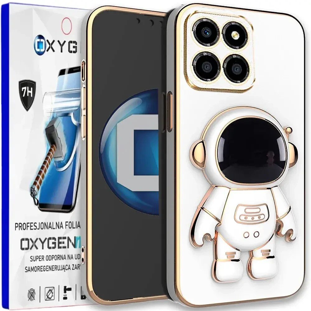 Na obrazie widoczne jest etui na telefon z motywem astronauty oraz opakowanie z napisem \'OXYGEN\' i grafiką młotka uderzającego w ekran. Etui ma biały kolor z elementami złota, a opakowanie zawiera tekst \'PROFESJONALNA FOLIA OXYGEN SUPER ODPORNA NA UDERZENIA SAMOREGENERUJĄCA ZARAZ\'.