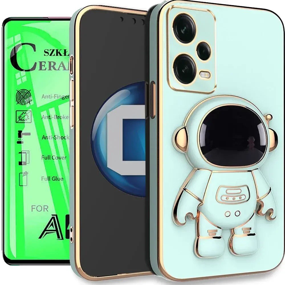 Obraz przedstawia etui na telefon z motywem astronauty oraz szkło ceramiczne z napisem \'SZKŁO CERAMICZNE\'. Etui ma jasny kolor z elementami złotymi, a szkło ceramiczne jest zielone z ikonami wskazującymi na jego właściwości, takie jak \'Anti-Finger\', \'Anti-Broken\', \'Anti-Shock\', \'Full Cover\', \'Full Glue\'.