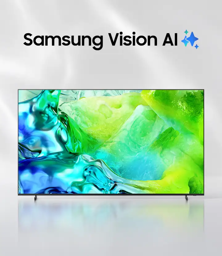 Telewizor z wyświetlaczem prezentującym abstrakcyjne, kolorowe wzory w odcieniach zieleni i niebieskiego. Nad ekranem widoczny jest napis \'Samsung Vision AI\' z ikoną błyszczącej gwiazdy.