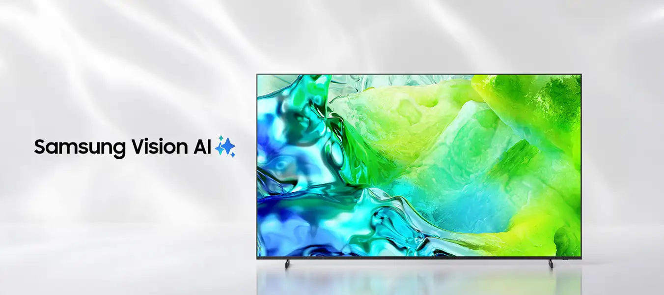 Obraz przedstawia telewizor z wyświetlanym kolorowym wzorem w odcieniach zieleni i błękitu. Obok znajduje się tekst \'Samsung Vision AI\'.