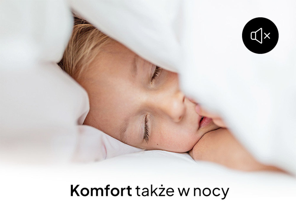 Dziecko śpi pod białą kołdrą, a w prawym górnym rogu znajduje się ikona wyciszenia dźwięku. Na dole widoczny jest tekst: \'Komfort także w nocy\'.