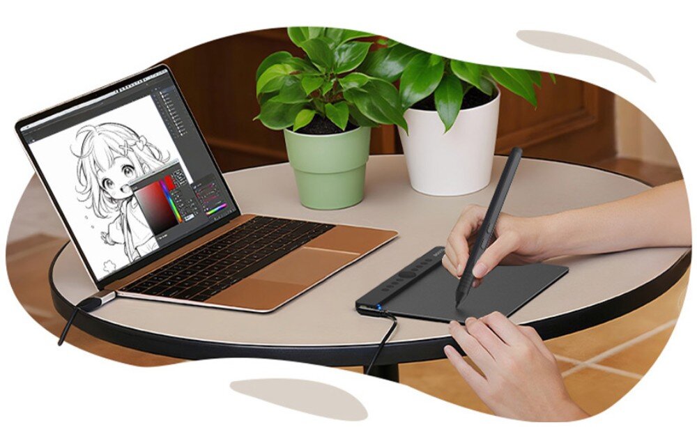 Tablet graficzny BOSTO T430 Osoba rysująca rysikiem na tablecie podłączonym do laptopa, na którego ekranie widać program graficzny z czarno-białym szkicem postaci, kompatybilność, aplikacje