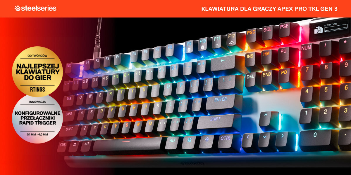 Klawiatura z podświetleniem RGB, z widocznymi klawiszami funkcyjnymi i numerycznymi. Na obrazie znajdują się napisy: \'steelseries\', \'KLAWIATURA DLA GRACZY APEX PRO TKL GEN 3\', \'NAJLEPSZA KLAWIATURA DO GIER\', \'KONFIGUROWALNE PRZEŁĄCZNIKI RAPID TRIGGER\'.
