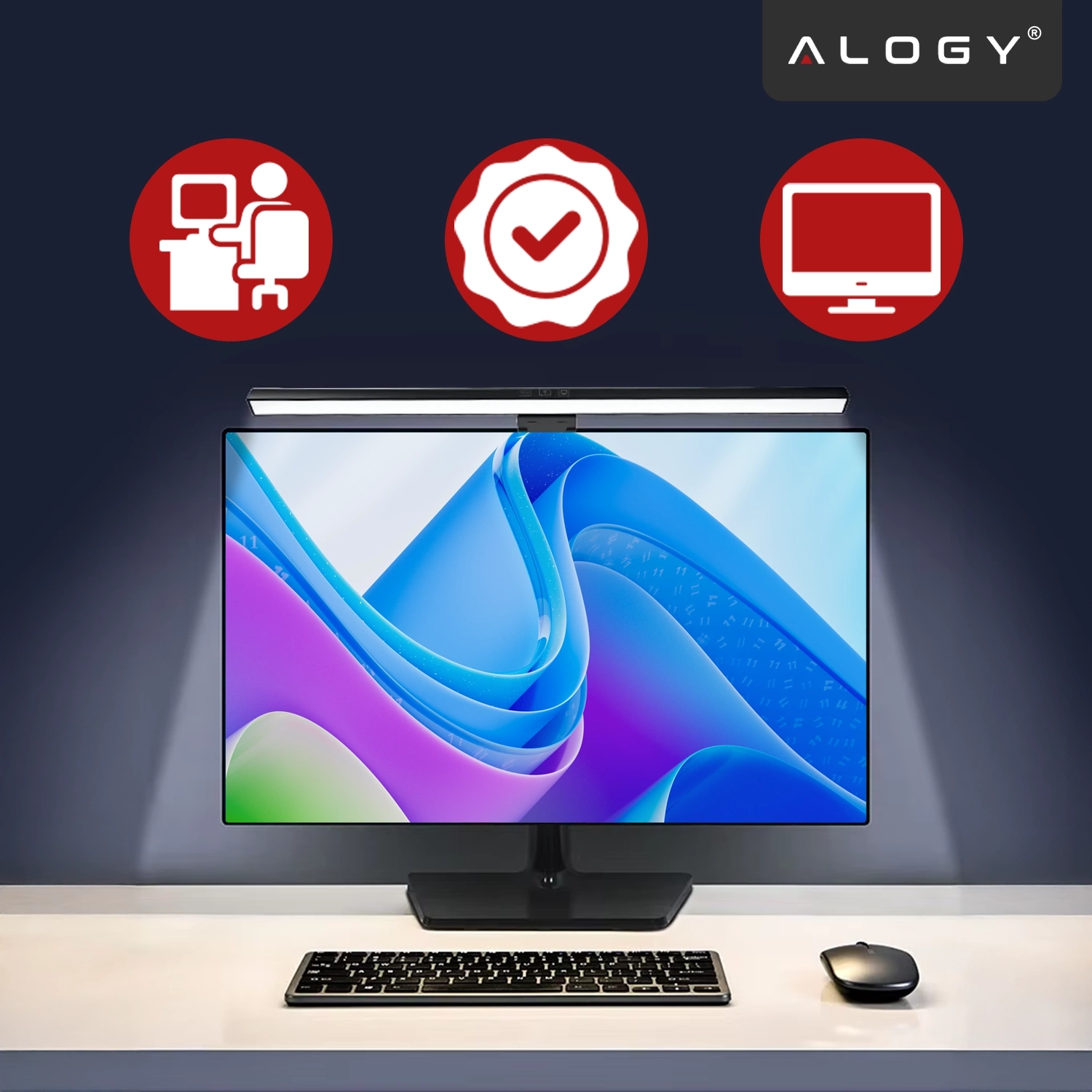 Na biurku znajduje się monitor z zamontowaną na górze lampką LED, a przed nim klawiatura i myszka. W tle widoczne są trzy czerwone ikony oraz logo \'ALOGY\'.