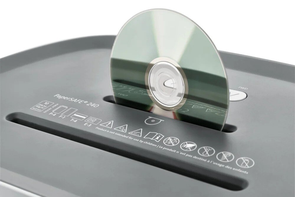 Niszczarka DAHLE PaperSAFE Zbliżenie na górny panel niszczarki z płytą CD częściowo wsuniętą w dedykowaną szczelinę oraz widocznymi ikonami ostrzegawczymi