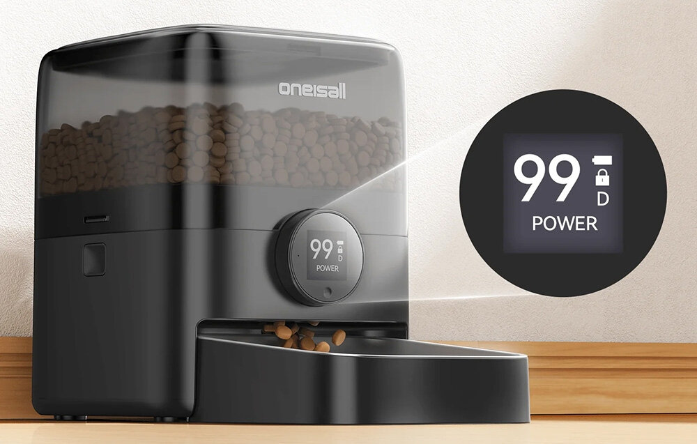 Na obrazie widoczny jest czarny automatyczny dozownik karmy z logo \'oneisall\', wypełniony suchą karmą. Na wyświetlaczu urządzenia widnieje napis \'99 D POWER\'.