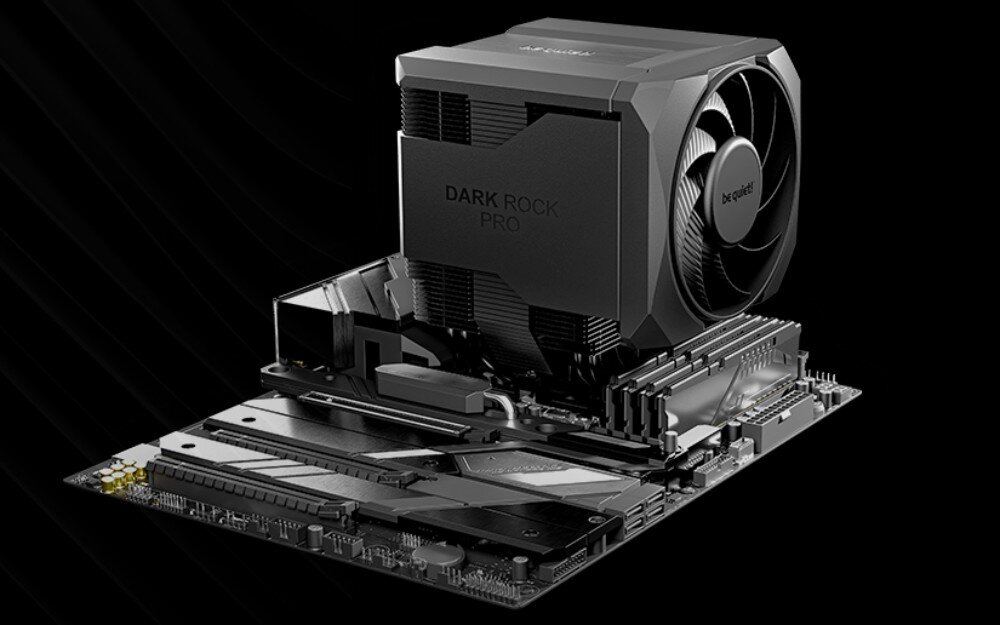 Chłodzenie CPU BE QUIET! Dark Rock Pro 6 Czarny cooler procesora z widocznym dużym wentylatorem zamontowany na ciemnej płycie głównej komputera, ciepłowody, radiator