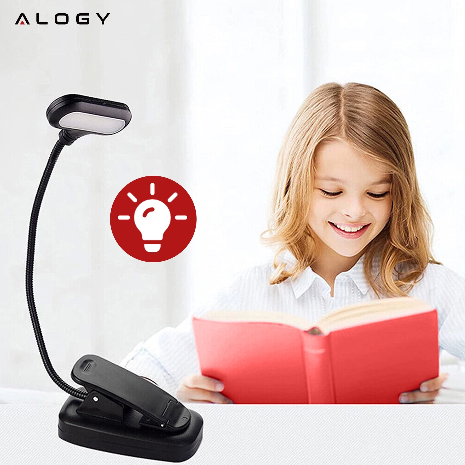 Na obrazie widoczna jest czarna lampa biurkowa LED z klipsem oraz dziecko czytające książkę. W tle znajduje się logo \'ALOGY\' i ikona żarówki na czerwonym tle.
