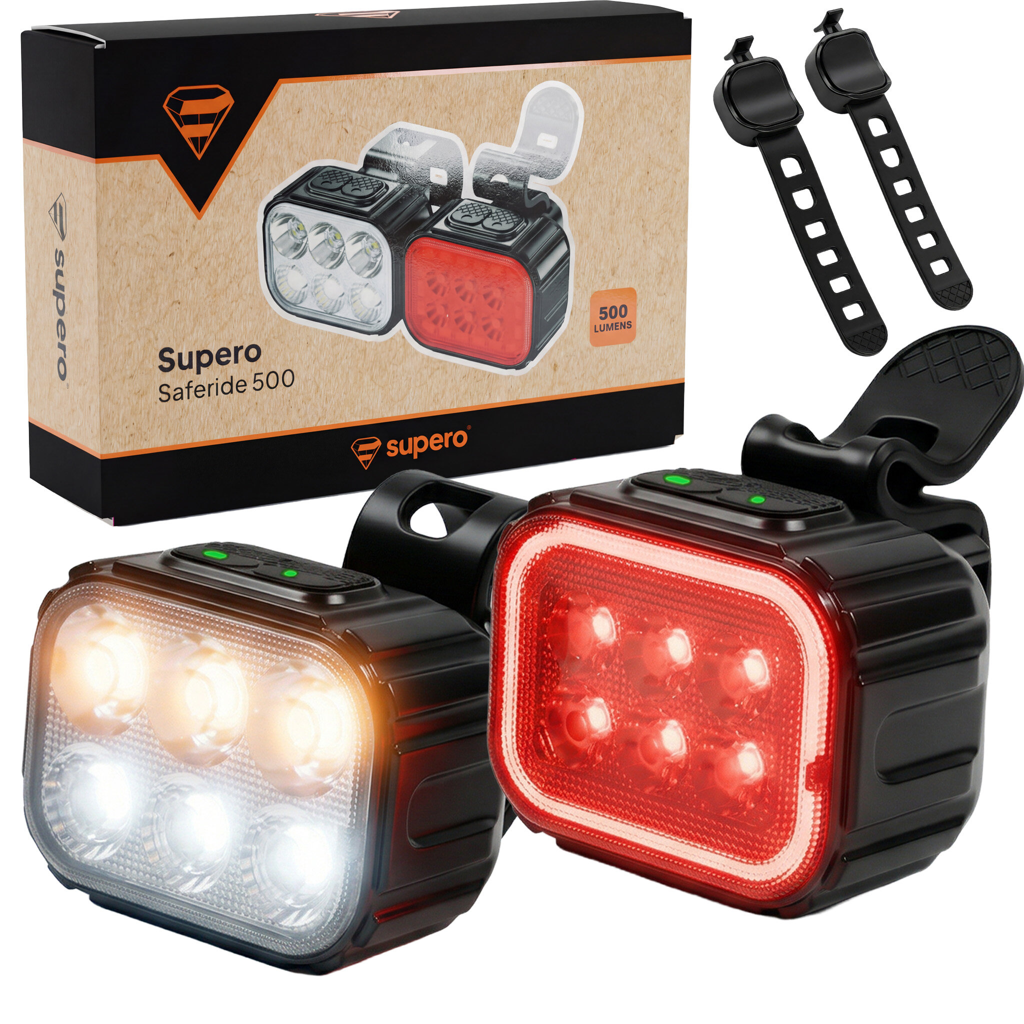 Na obrazie widoczne są dwie lampki rowerowe LED, jedna świecąca na biało, druga na czerwono, oraz opakowanie z napisem \'Supero Saferide 500\'. Obok znajdują się dwa czarne paski mocujące.
