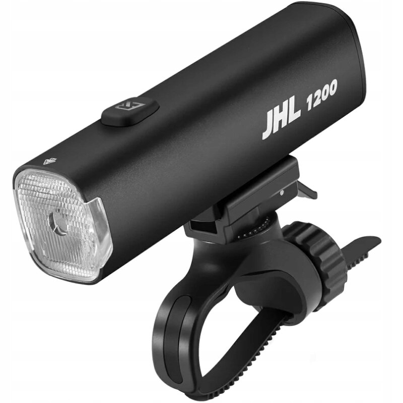 Czarna lampka rowerowa z napisem \'JHL 1200\' na obudowie, wyposażona w uchwyt montażowy. Posiada przezroczysty klosz i przycisk na górze.