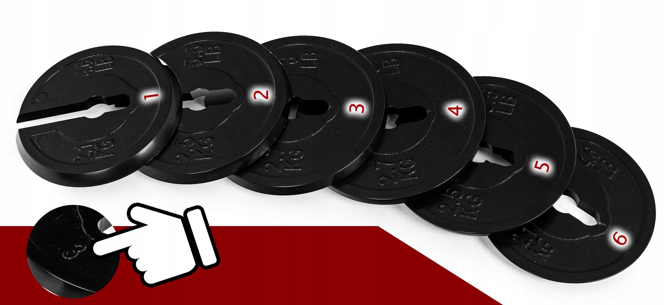 Na obrazie widoczne są czarne talerze do hantli z numerami od 1 do 6. W dolnym lewym rogu znajduje się grafika dłoni wskazującej na jeden z talerzy.