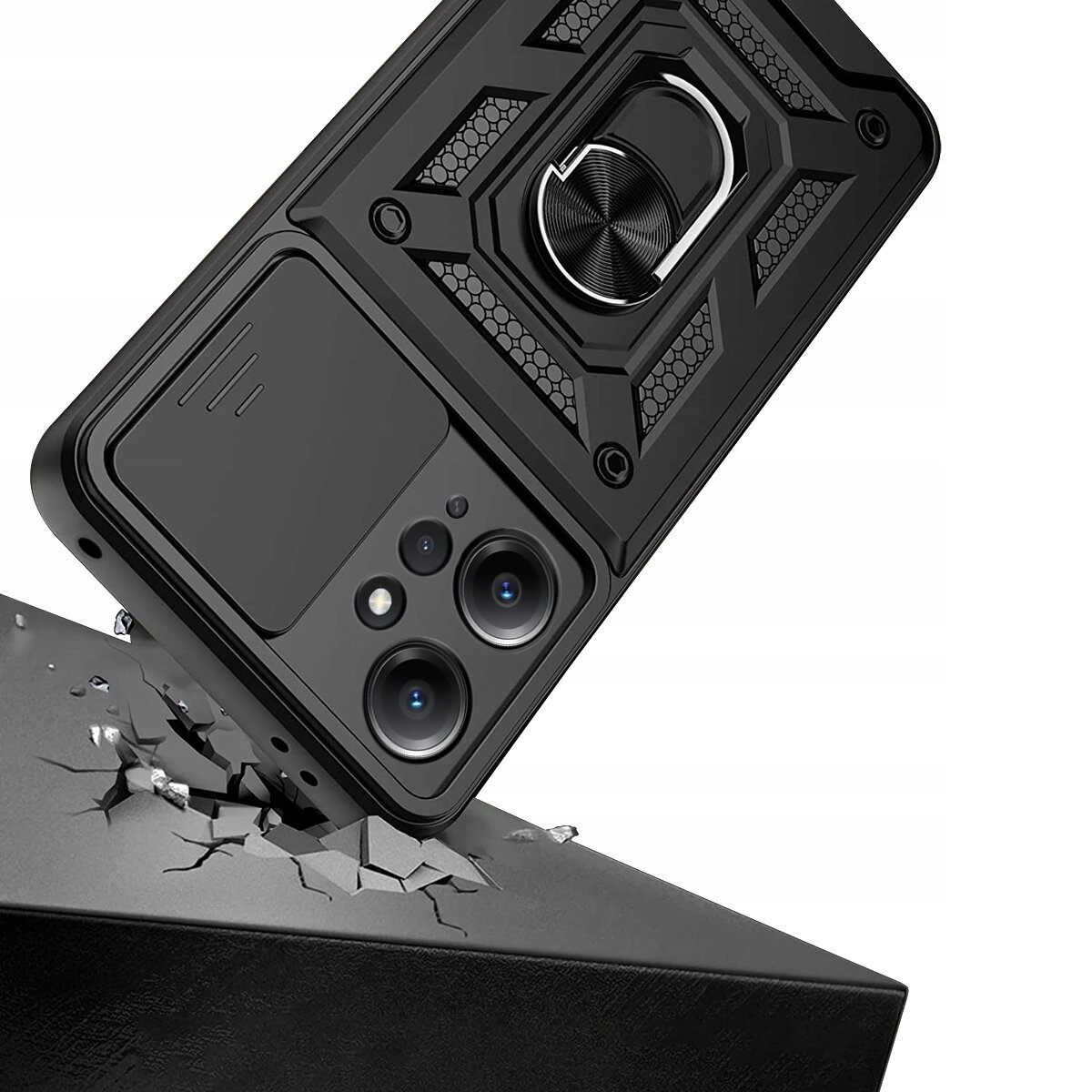 Etui do telefonu z pierścieniem na tylnej części, przedstawione w dynamicznej pozie, jakby uderzało w powierzchnię, powodując pęknięcia. Produkt ma pancerne wykończenie i widoczne dwa otwory na aparaty.
