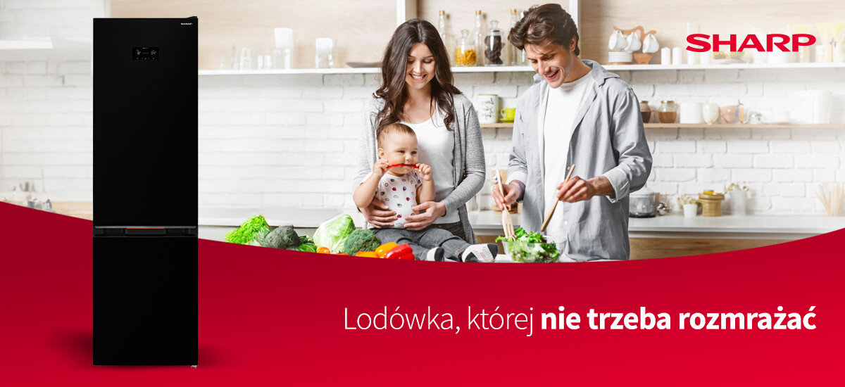 Obraz przedstawia czarną lodówkę z logo SHARP po prawej stronie. Na dole widnieje tekst: \'Lodówka, której nie trzeba rozmrażać\'.