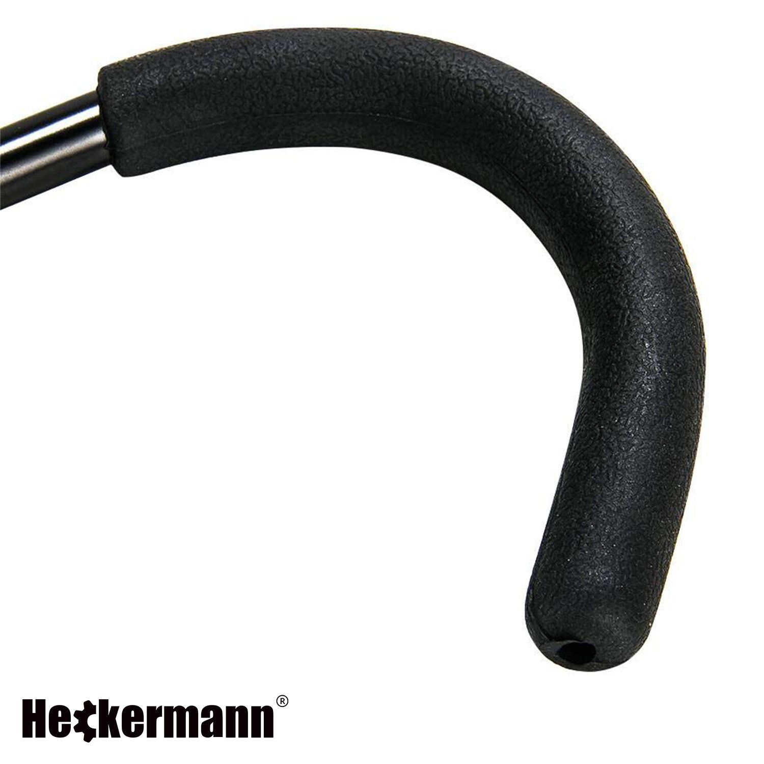 Czarny, zakrzywiony uchwyt z teksturowaną powierzchnią. W lewym dolnym rogu widoczne jest logo \'Heckermann\'.
