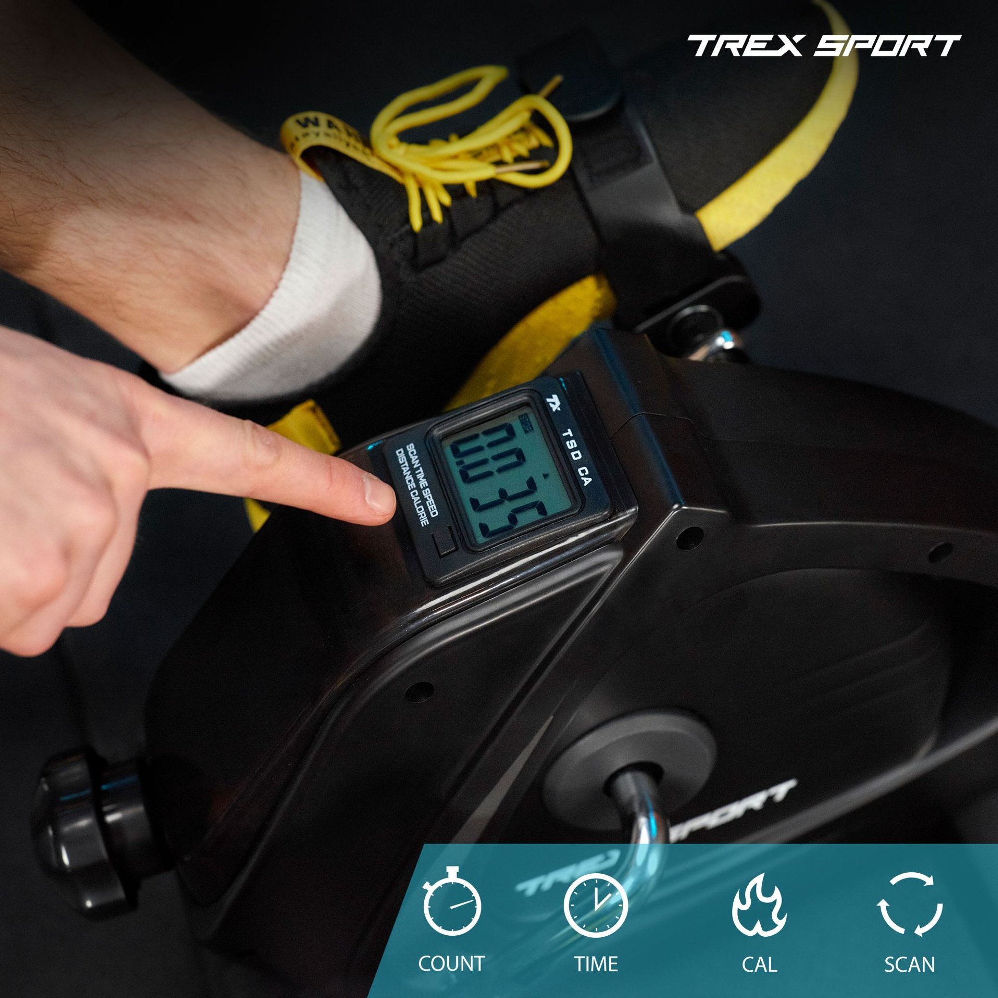 Osoba używa mini roweru treningowego z wyświetlaczem pokazującym \'00:39\'. Na obrazie widoczne jest logo \'TREX SPORT\'.