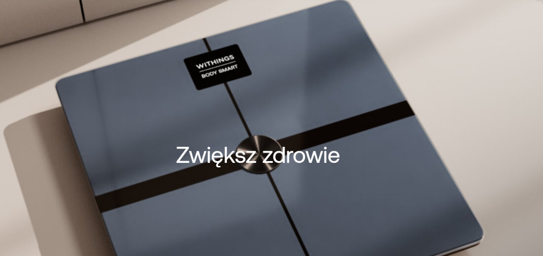 Na obrazie widoczna jest waga łazienkowa z napisem \'WITHINGS BODY SMART\' oraz tekstem \'Zwiększ zdrowie\'.