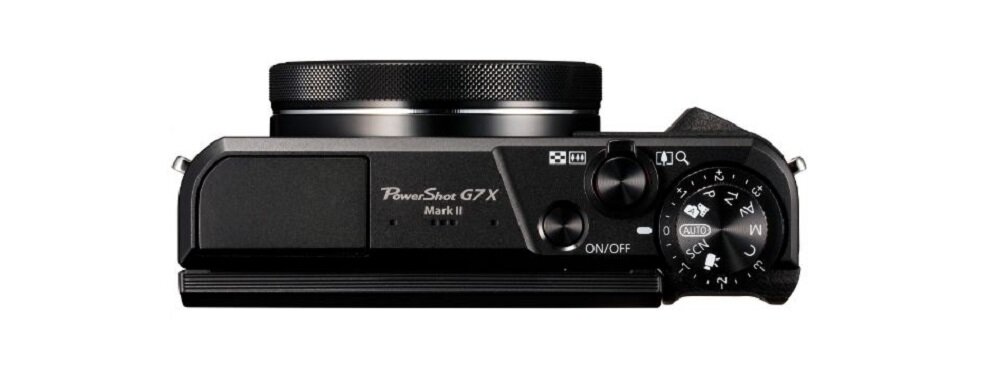 Widok z góry na aparat fotograficzny z widocznym napisem \'PowerShot G7 X Mark II\' oraz pokrętłami i przyciskiem ON/OFF.