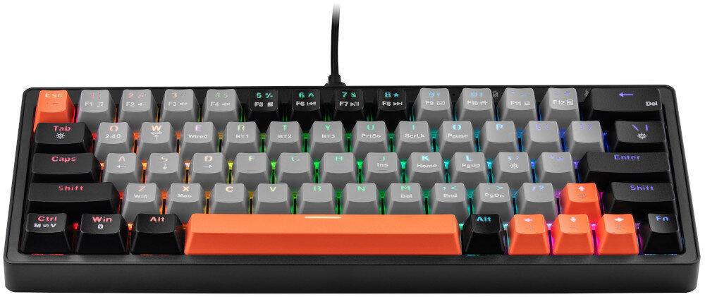 Klawiatura mechaniczna z kolorowymi klawiszami, w tym pomarańczowym klawiszem spacji i podświetleniem RGB. Widoczne są klawisze z oznaczeniami liter i cyfr oraz dodatkowe funkcje na klawiszach funkcyjnych.