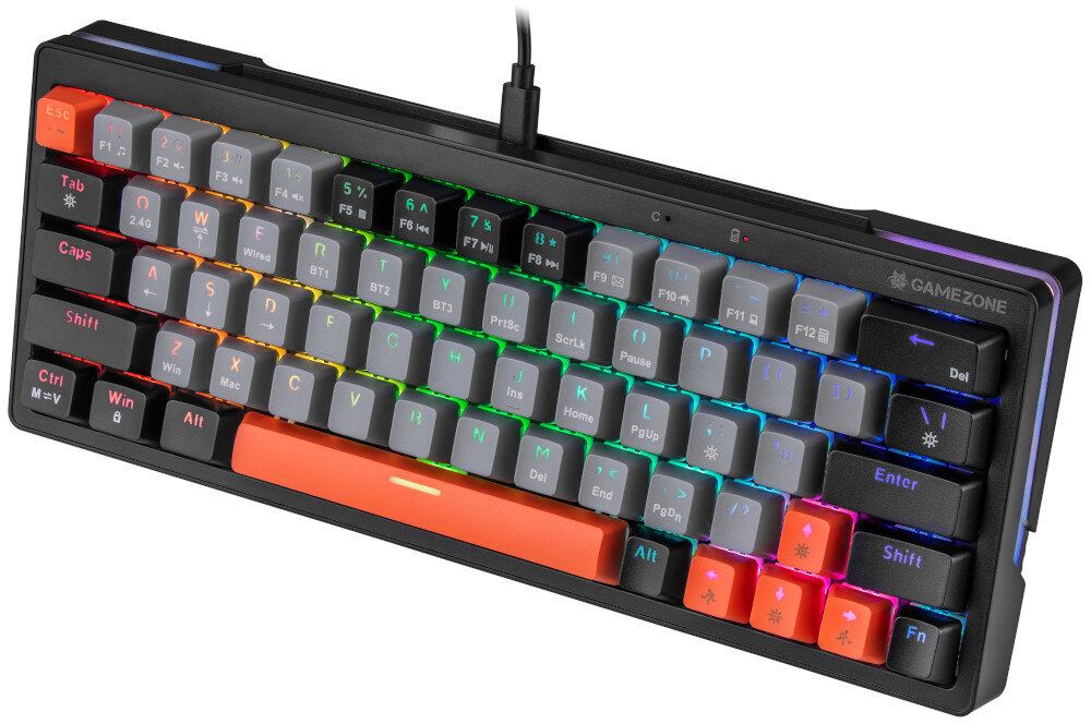 Klawiatura mechaniczna z podświetleniem RGB, posiada klawisze w różnych kolorach, w tym pomarańczowy klawisz spacji. Na obudowie widoczne jest logo \'GAMEZONE\'.