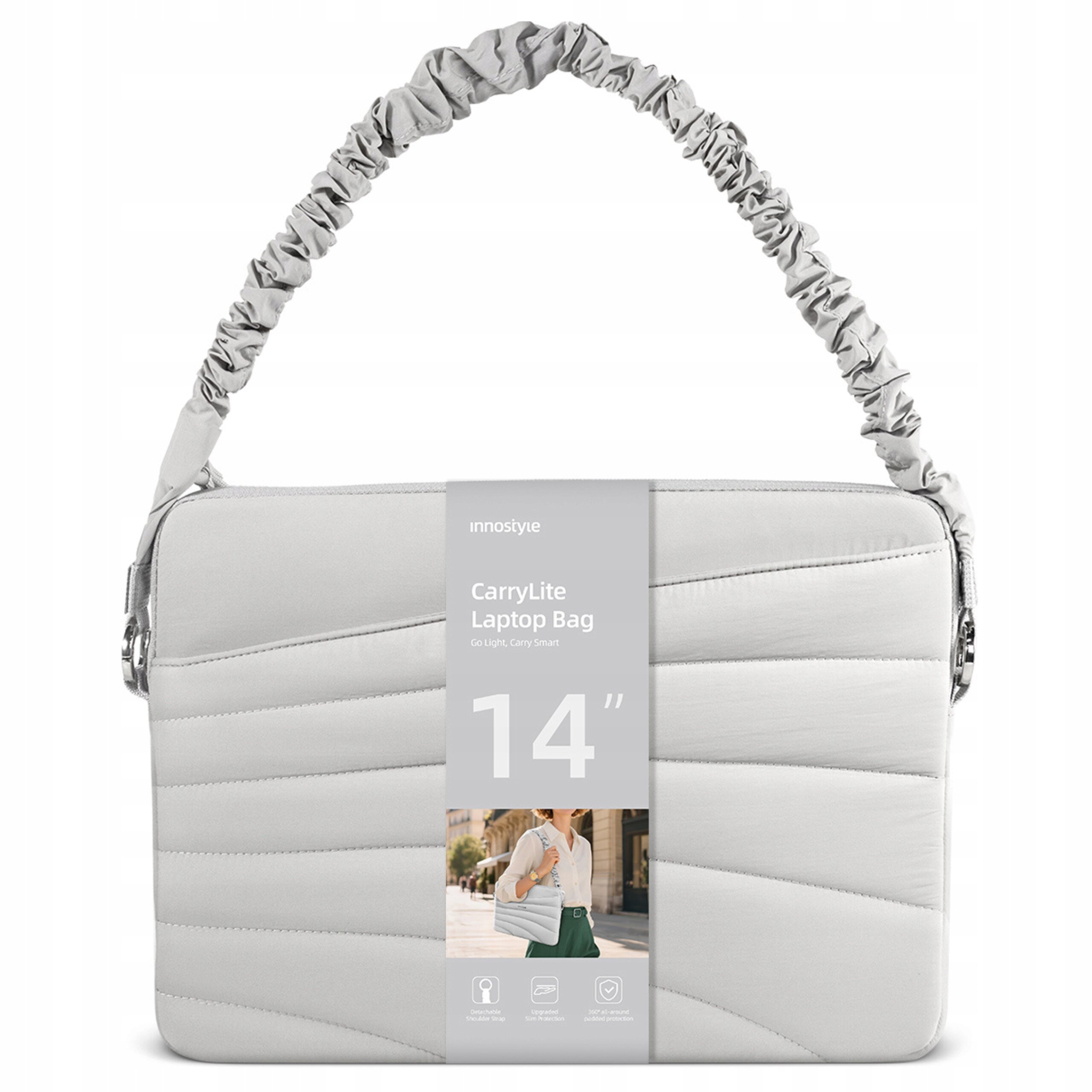 Szara torba na laptopa z marszczonym paskiem, oznaczona etykietą z napisem \'innostyle CarryLite Laptop Bag Go Light, Carry Smart 14\