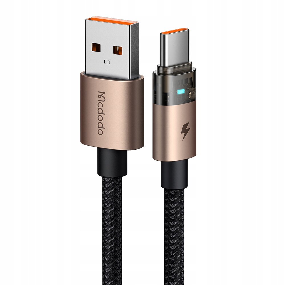 Na obrazie widoczny jest kabel USB z końcówkami USB-A i USB-C w kolorze złotym. Na jednej z końcówek znajduje się logo \'Mcdodo\'.