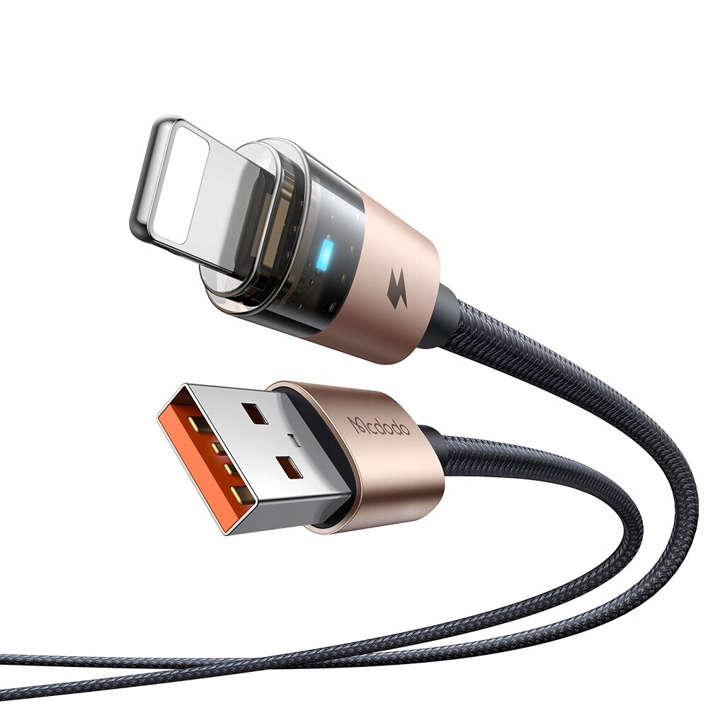 Złoty kabel USB z końcówką Lightning i USB, z widocznym logo \'Mcdodo\'. Kabel ma plecioną osłonę i podświetlenie LED na końcówce Lightning.