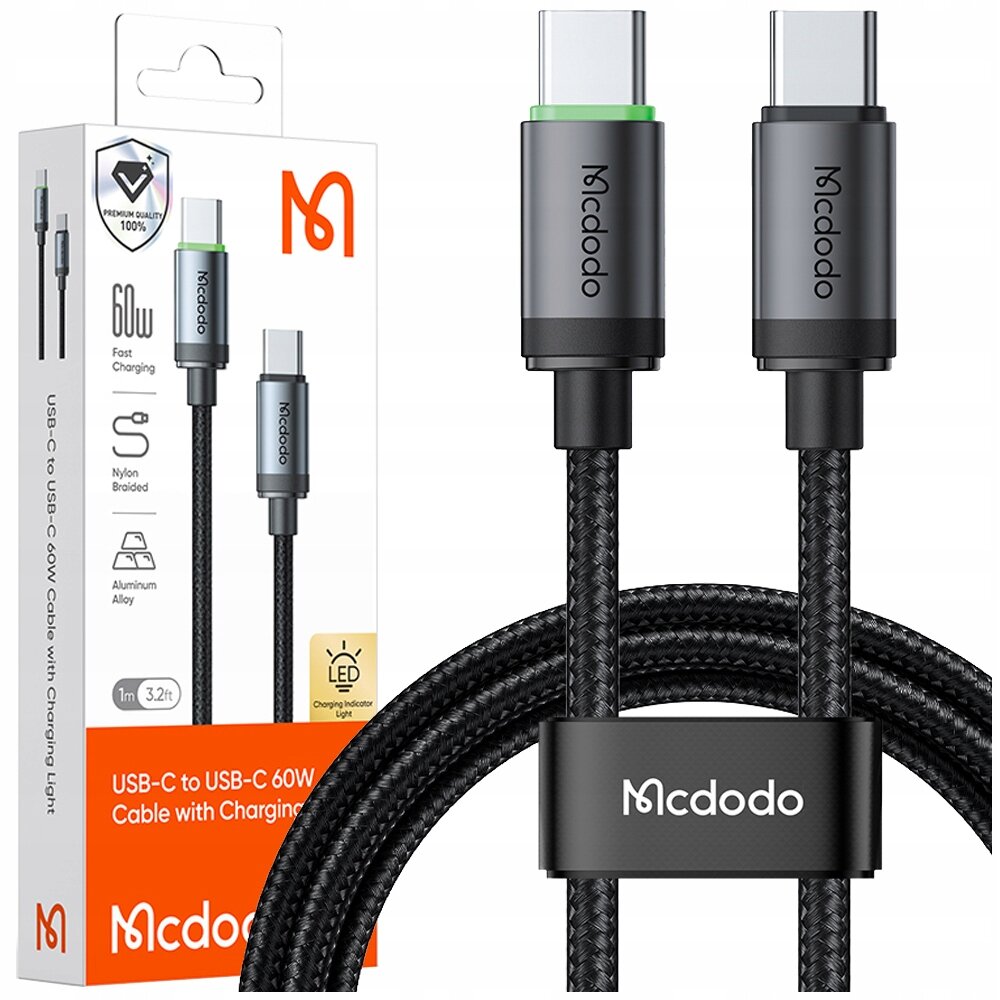 Na obrazie widoczny jest czarny kabel USB-C z plecionym nylonowym oplotem oraz opakowanie z napisem \'Mcdodo\' i informacjami o produkcie, takimi jak \'60W Fast Charging\' i \'LED Charging Indicator Light\'.