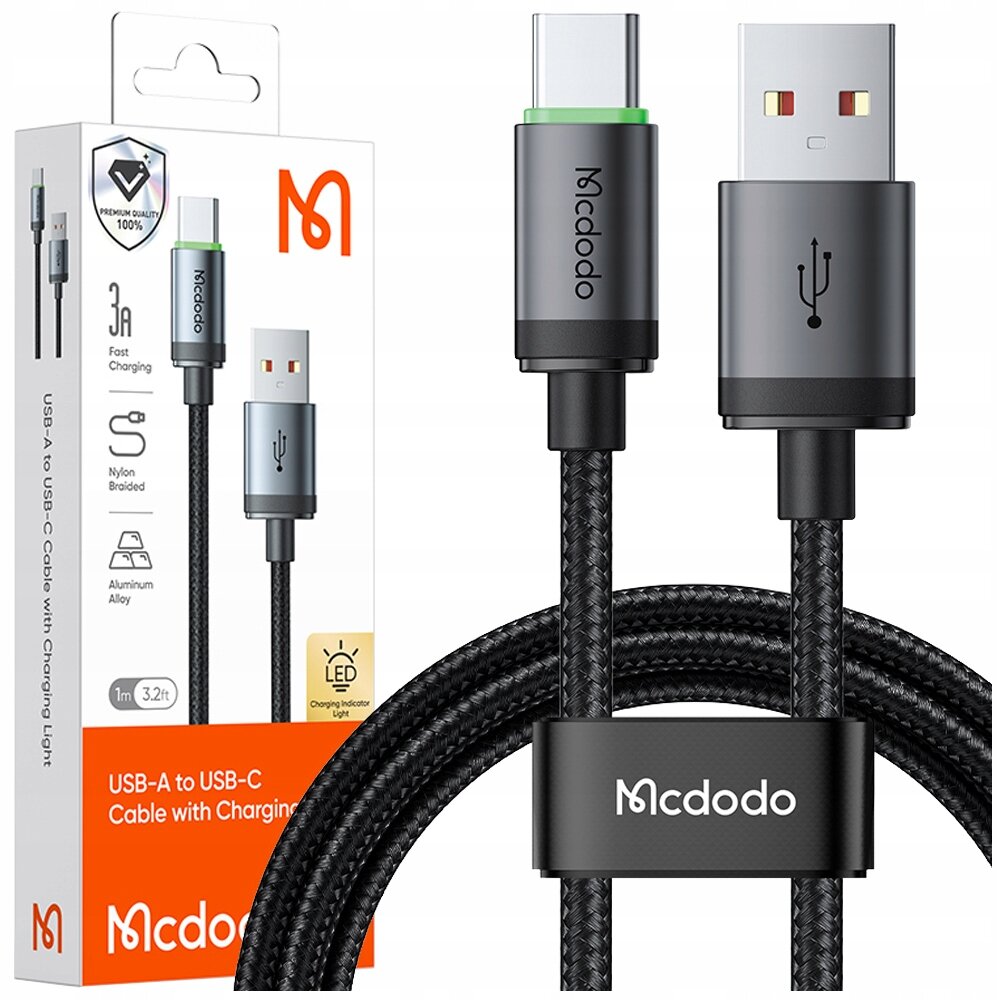 Obraz przedstawia kabel USB-A do USB-C marki Mcdodo z plecionym nylonowym oplotem. Na opakowaniu widoczne są informacje: \'3A Fast Charging\', \'Nylon Braided\', \'Aluminum Alloy\', \'LED Charging Indicator Light\'.