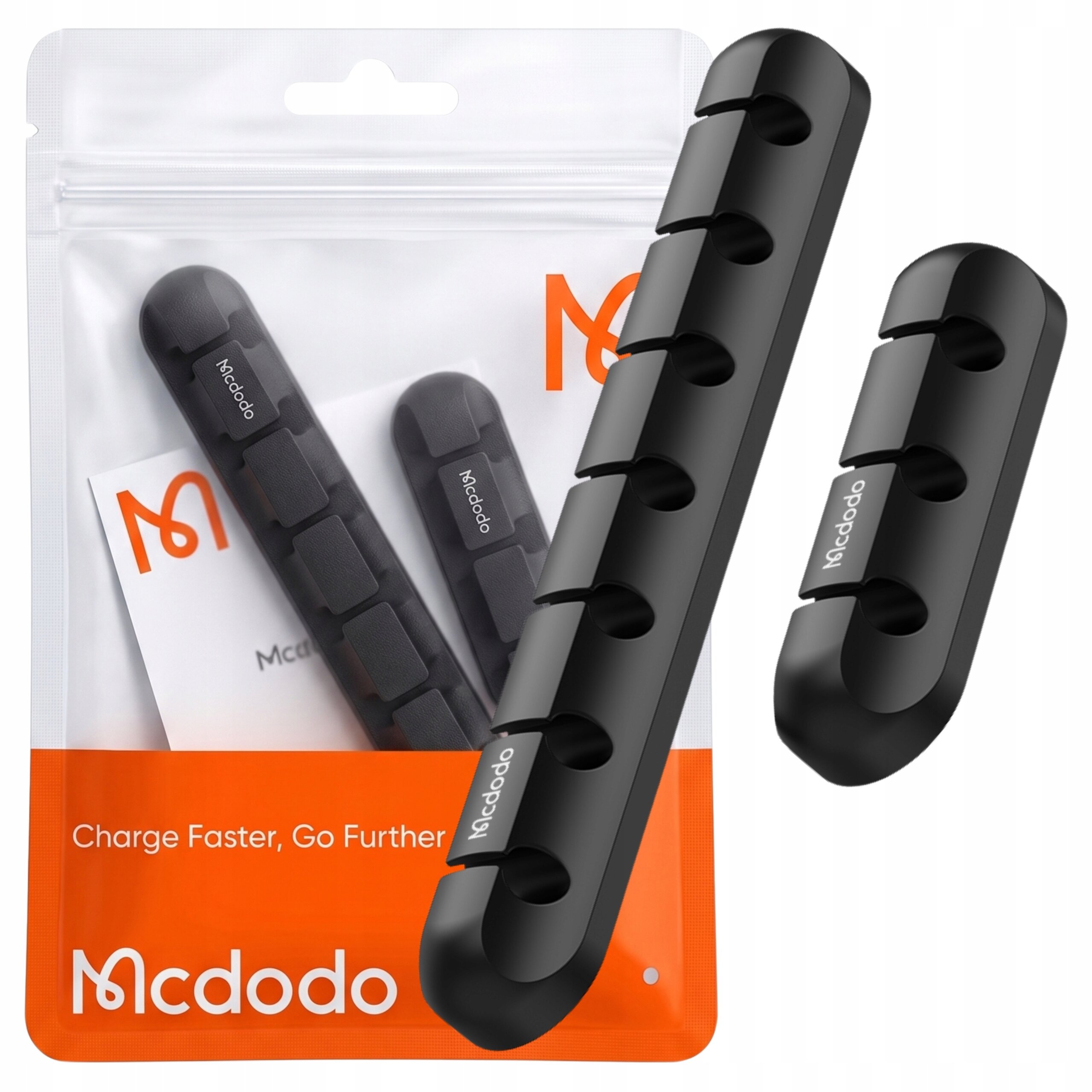 Na obrazie widoczny jest czarny organizer na kable z kilkoma otworami, obok opakowanie z logo Mcdodo i napisem \'Charge Faster, Go Further\'.
