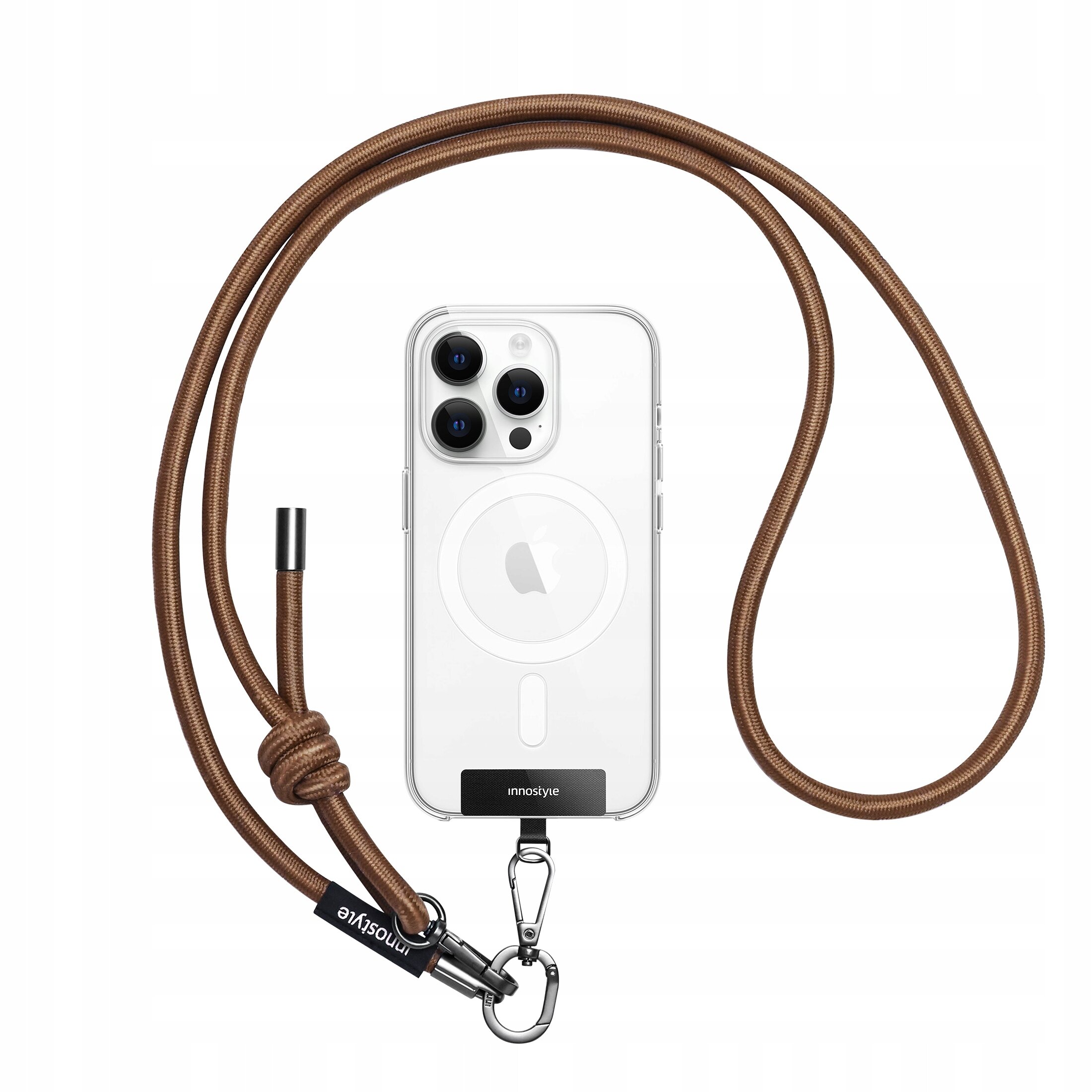 Brązowa smycz do telefonu z napisem \'innostyle\' przymocowana do przezroczystego etui na telefon z trzema obiektywami aparatu.