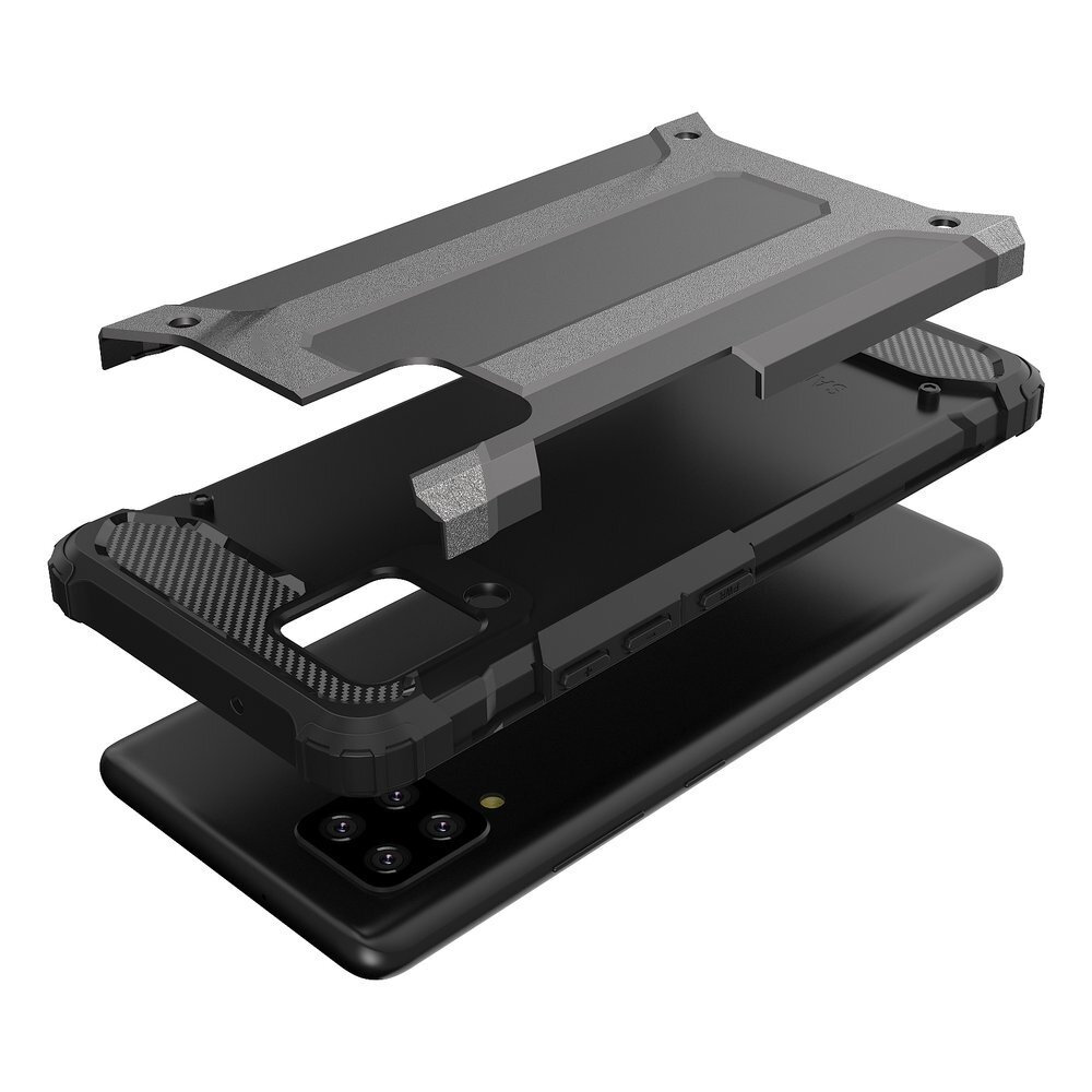 Obraz przedstawia rozłożone na części etui ochronne na smartfon w kolorze srebrnym i czarnym. Etui ma pancerne elementy i jest pokazane w trzech warstwach nad czarnym telefonem.