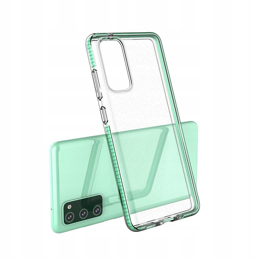 Obraz przedstawia przezroczyste etui z jasnoniebieską ramką, przeznaczone do telefonu z trzema aparatami. Etui jest ustawione na tle telefonu w tym samym kolorze.