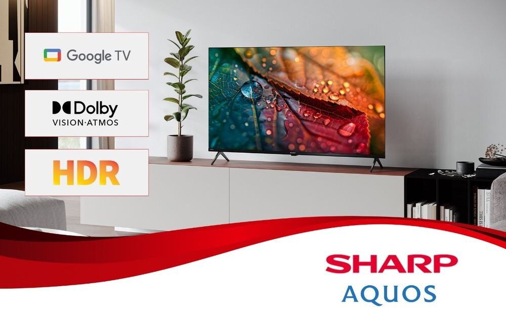 SHARP 70HL4465E telewizor Google TV Dolby Vision Dolby Atmos duży ekran, telewizor stojący na komodzie w pomieszczeniu