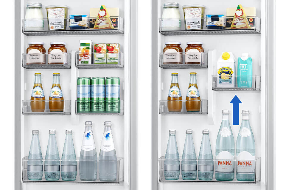 Obraz przedstawia wnętrze lodówki z różnymi produktami spożywczymi, takimi jak napoje, słoiki z marmoladą i kartony z sokiem. Na drzwiach lodówki widoczna jest niebieska strzałka wskazująca na półkę z kartonem napoju oznaczonym jako \'FRT\'.
